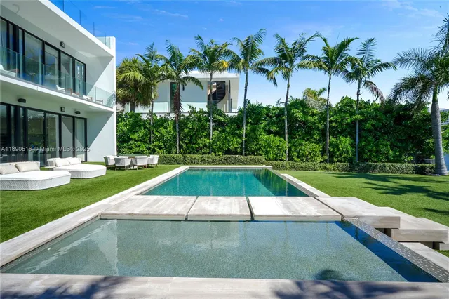 a view of swimming pool with a garden