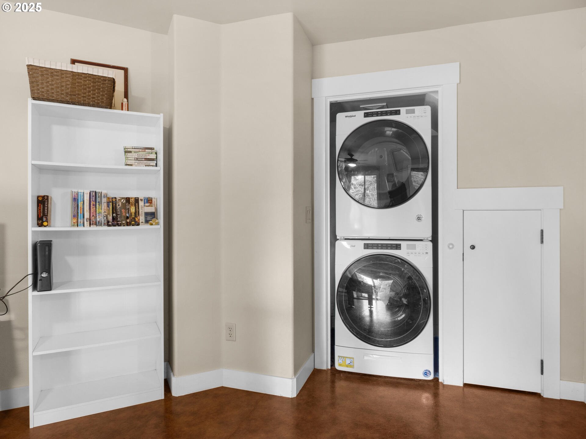 8435 Treasure Rocks Road Nehalem, OR 97131 - Photo 36 of 41 a view of a hallway with washer and dryer