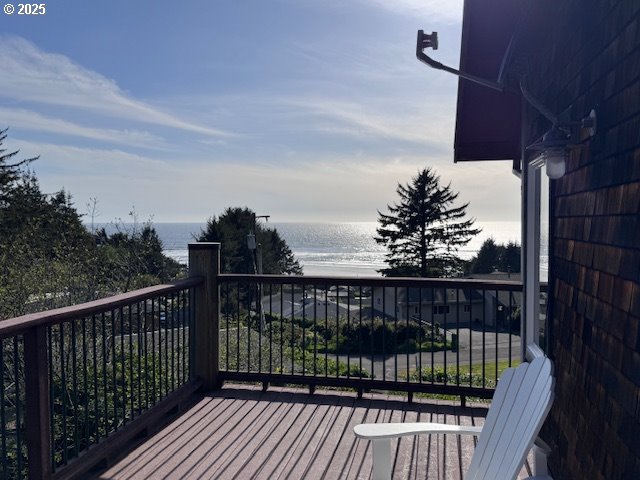 8435 Treasure Rocks Road Nehalem, OR 97131 - Photo 40 of 41 a view of balcony with wooden floor
