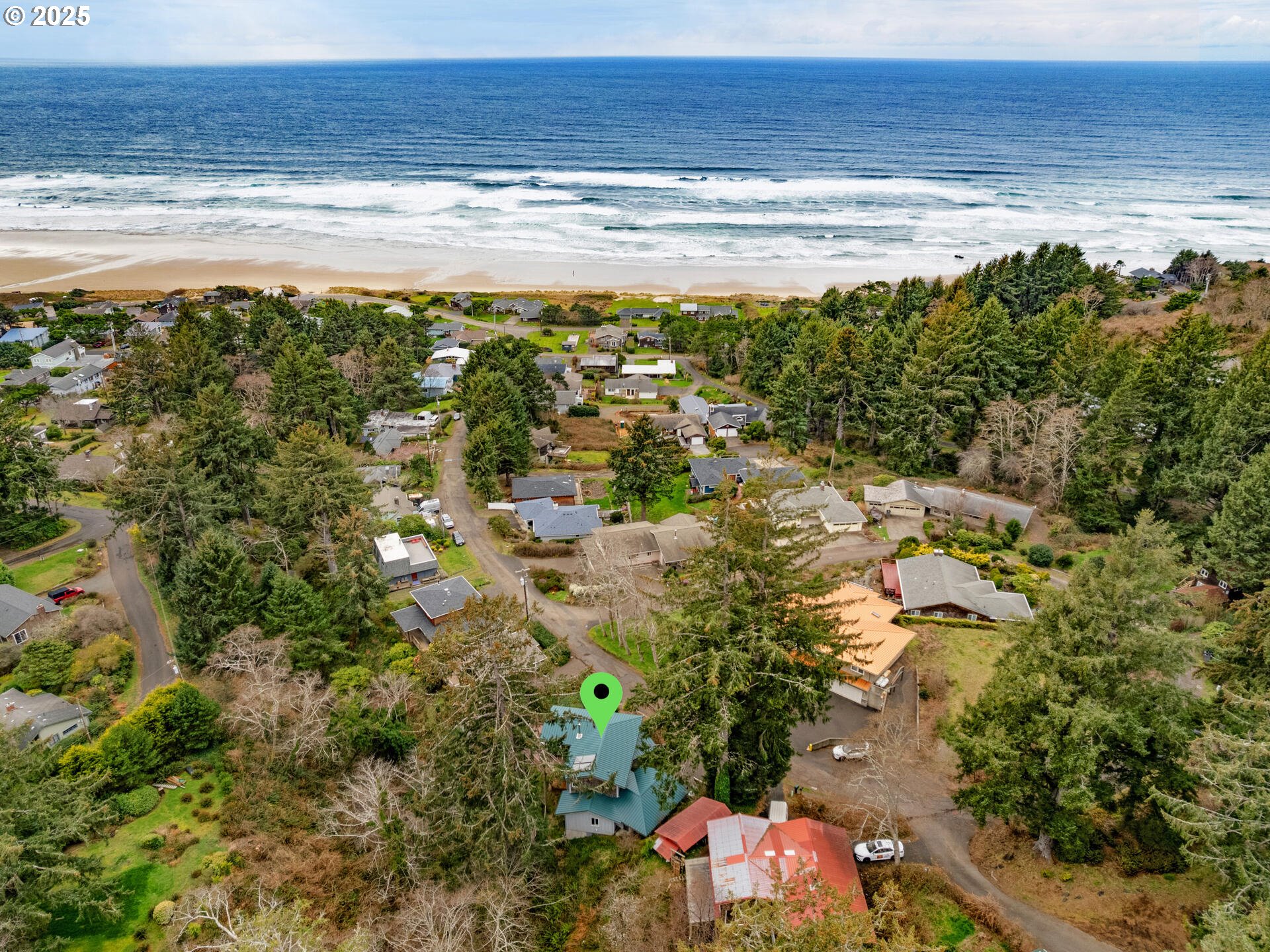 8435 Treasure Rocks Road Nehalem, OR 97131 - Photo 7 of 41 a view of an ocean and beach