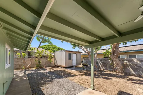 an aerial view of residential houses and outdoor space
