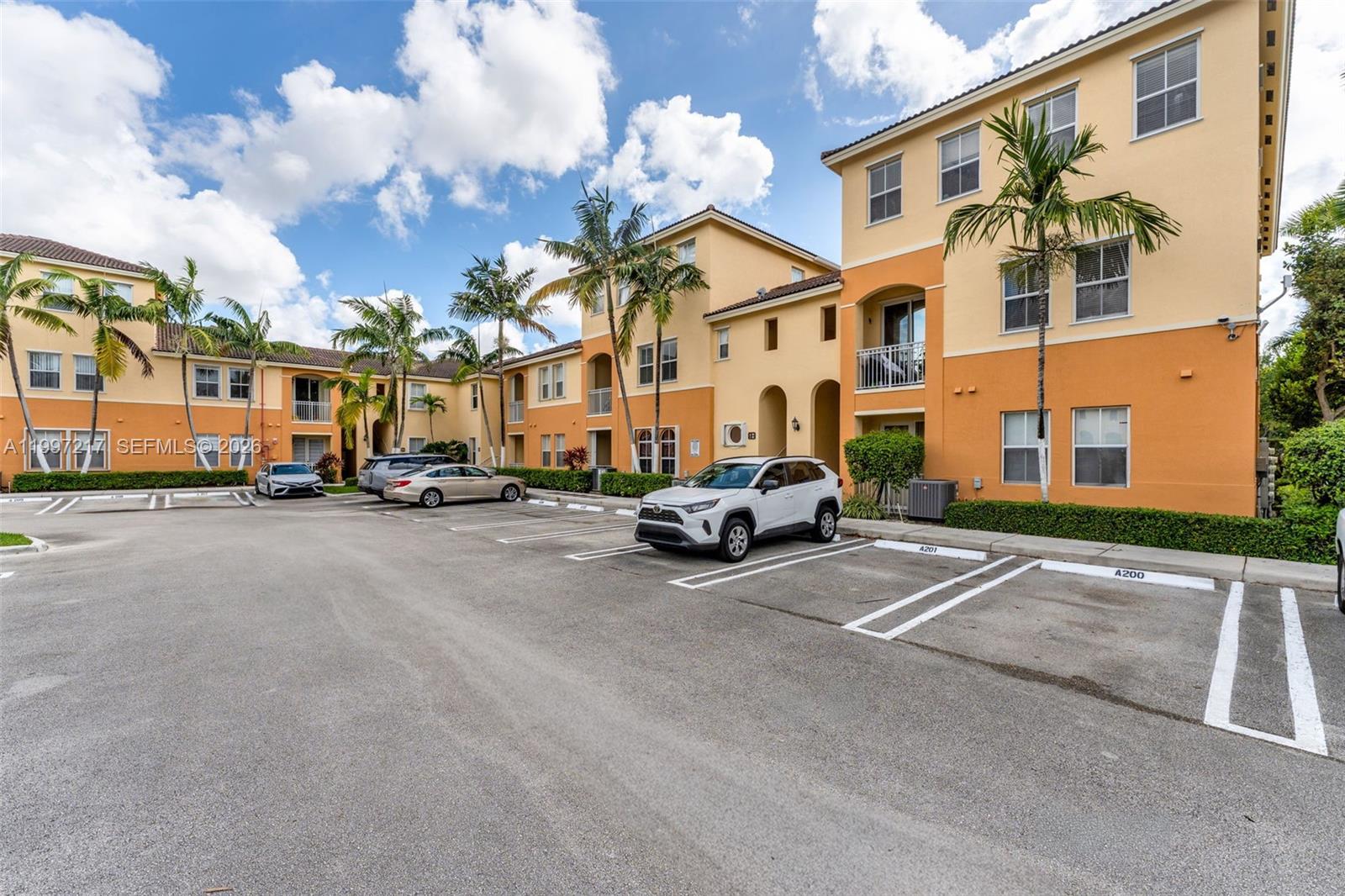 10012 Northwest 7th Street, Unit 206 Miami, FL 33172 - Photo 27 of 35 a view of a street with a building