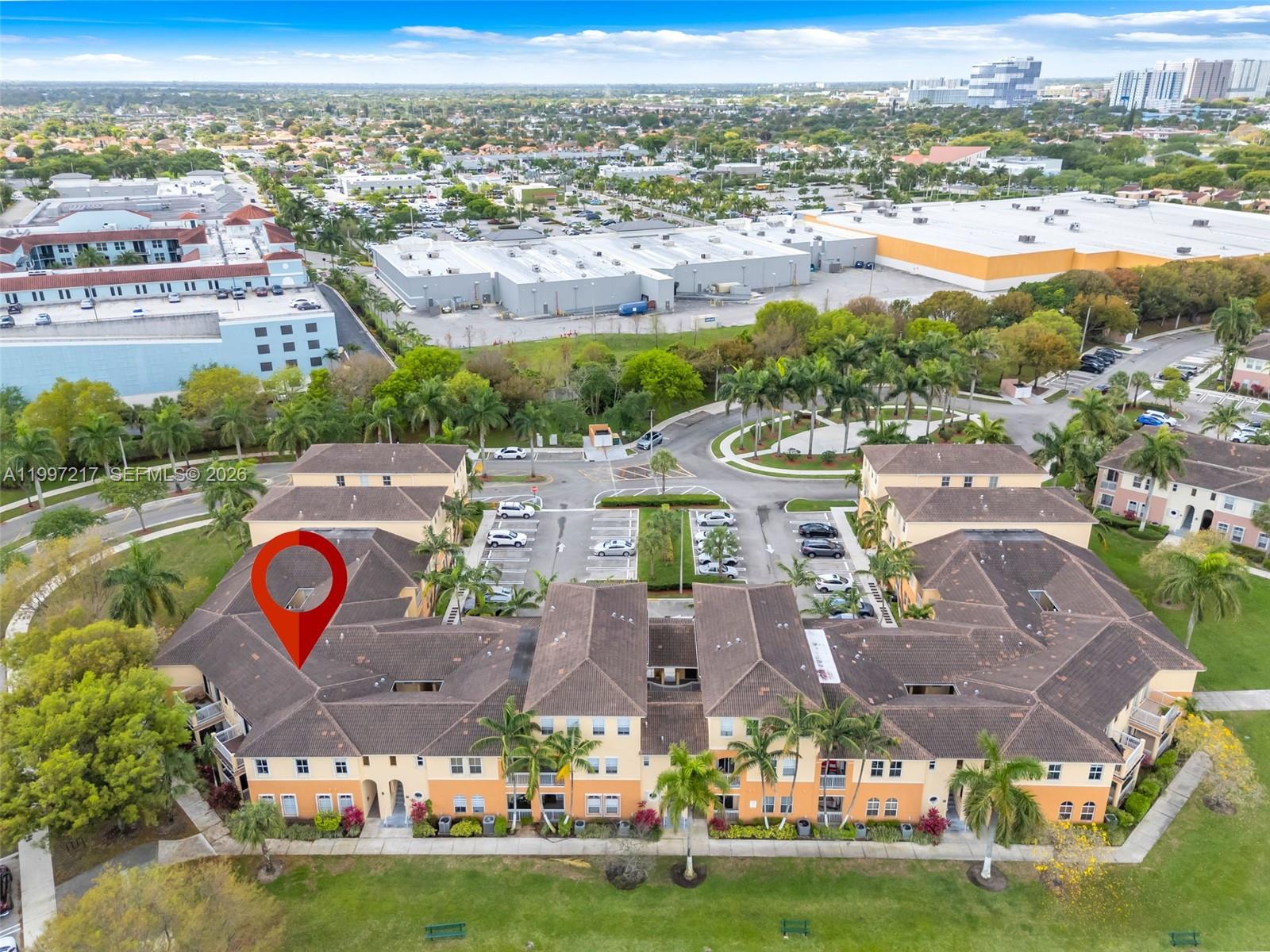 10012 Northwest 7th Street, Unit 206 Miami, FL 33172 - Photo 34 of 35 an aerial view of residential houses with outdoor space and swimming pool