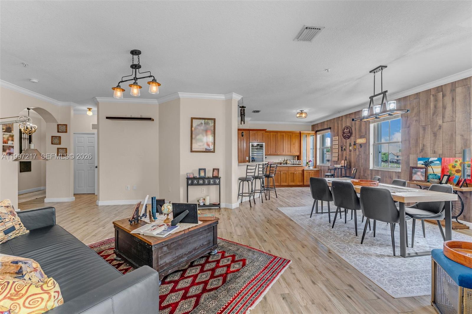 10012 Northwest 7th Street, Unit 206 Miami, FL 33172 - Photo 10 of 35 a living room with lots of furniture and kitchen view