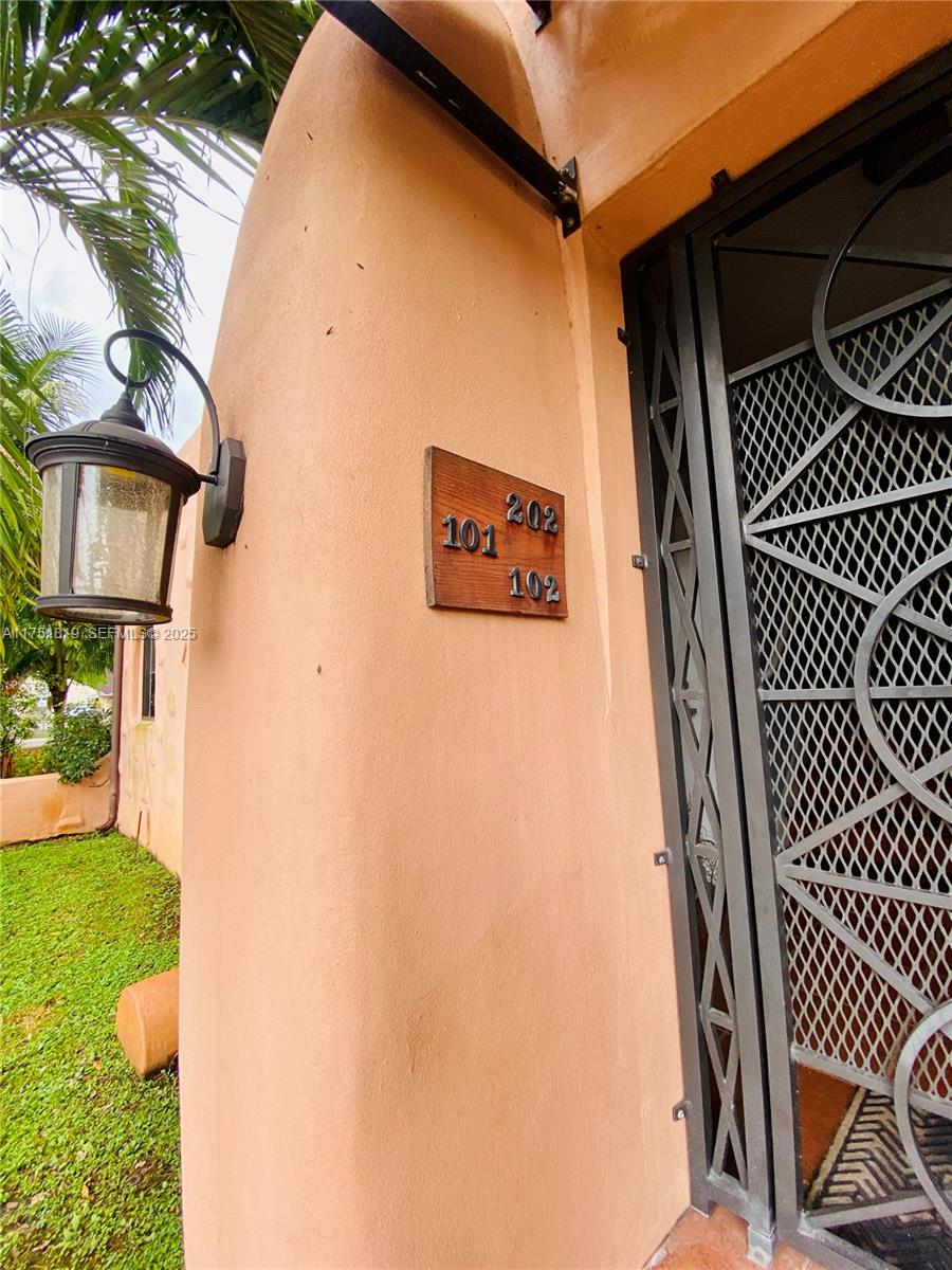 200 Azure Way Miami Springs, FL 33166 - Photo 14 of 54 a view of a back yard