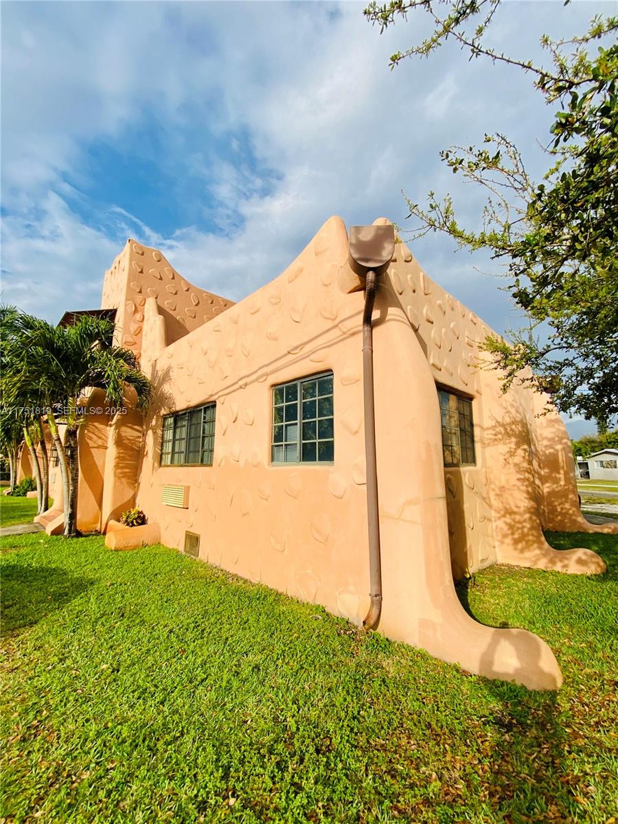 200 Azure Way Miami Springs, FL 33166 - Photo 16 of 54 front view of house with a yard