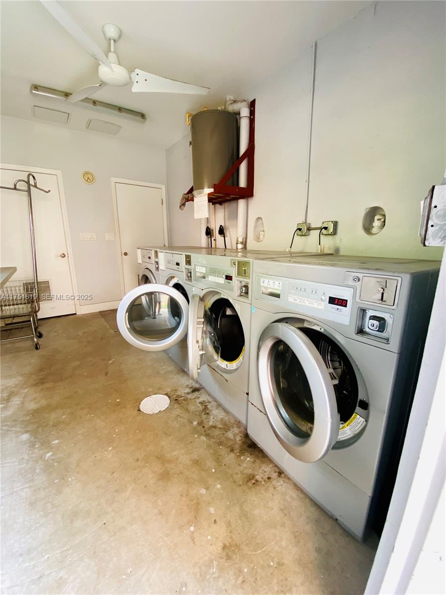 200 Azure Way Miami Springs, FL 33166 - Photo 31 of 54 a utility room with dryer and washer