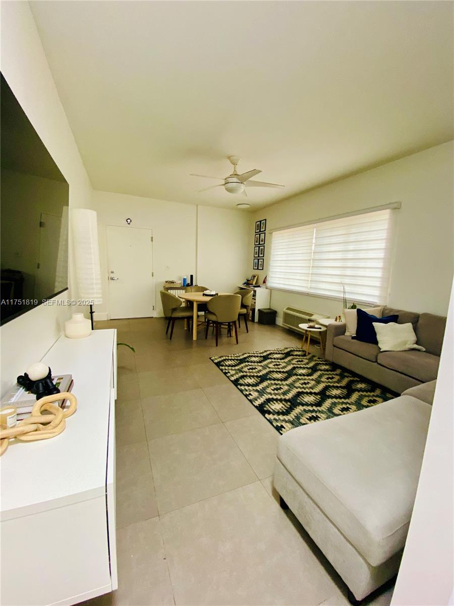200 Azure Way Miami Springs, FL 33166 - Photo 37 of 54 a kitchen with stainless steel appliances granite countertop a sink a stove counter space and chairs