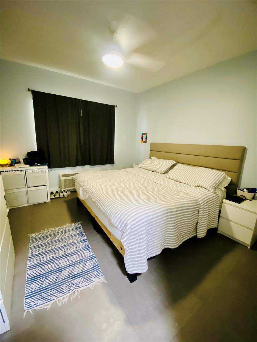 200 Azure Way Miami Springs, FL 33166 - Photo 41 of 54 a bedroom with a bed and dresser