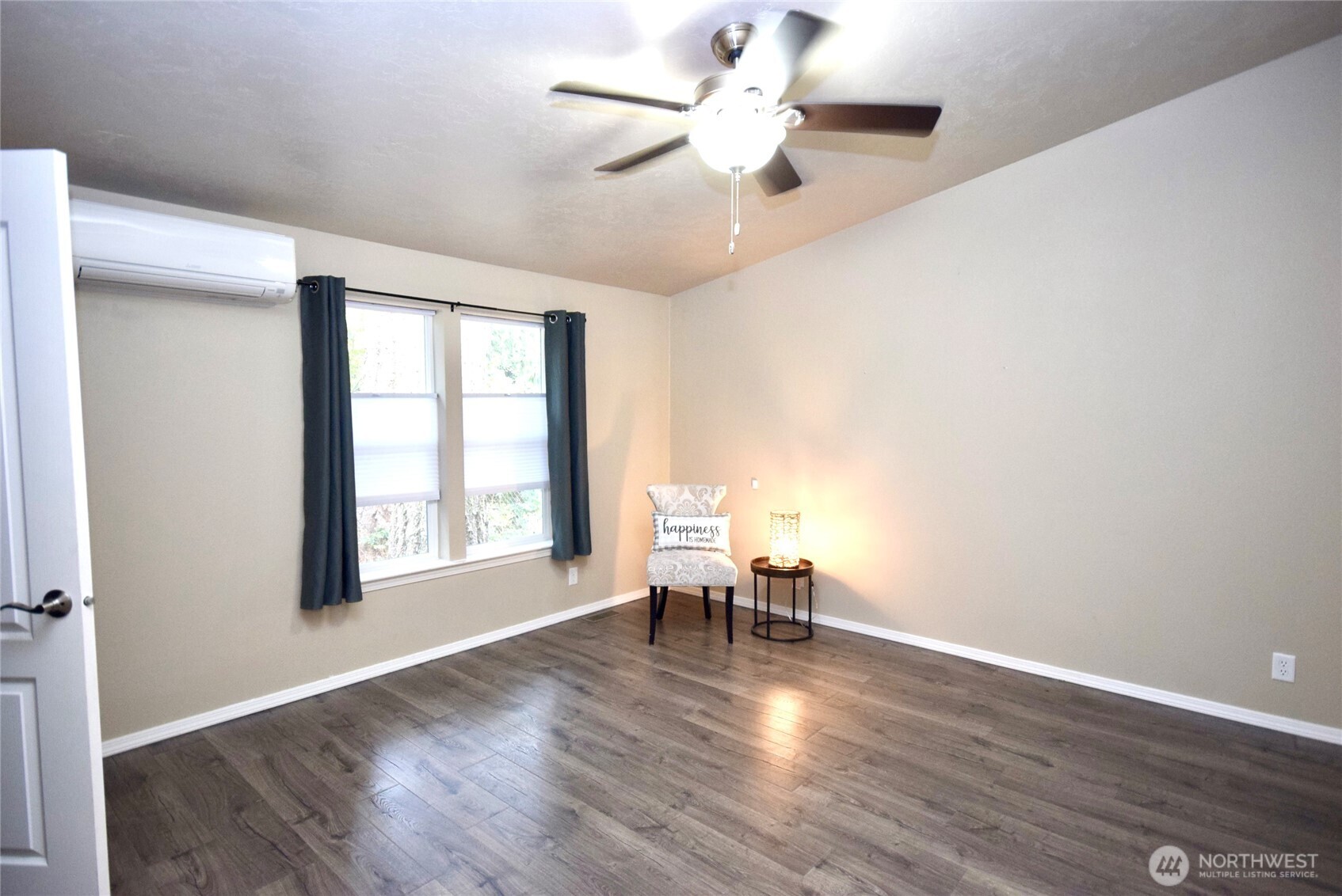 375 Dungeness Meadows Sequim, WA 98382 - Photo 16 of 27 wooden floor in an empty room with a window