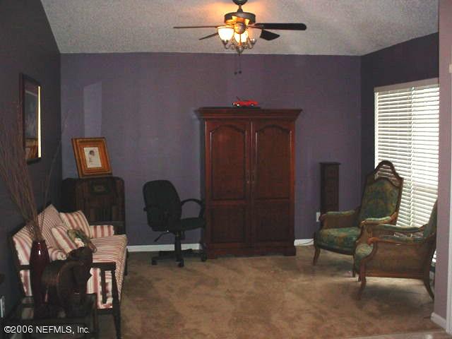 3547 Whisper Creek Boulevard Middleburg, FL 32068 - Photo 4 of 10 a view of a livingroom with furniture