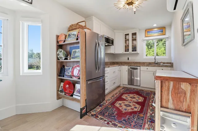 a view of a livingroom with furniture and window