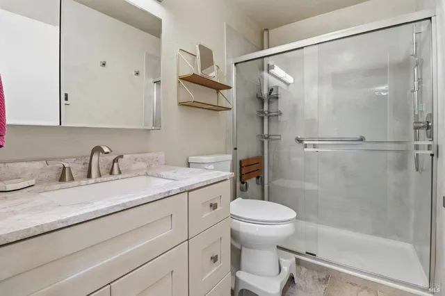 a view of storage and utility room with racks on the wall