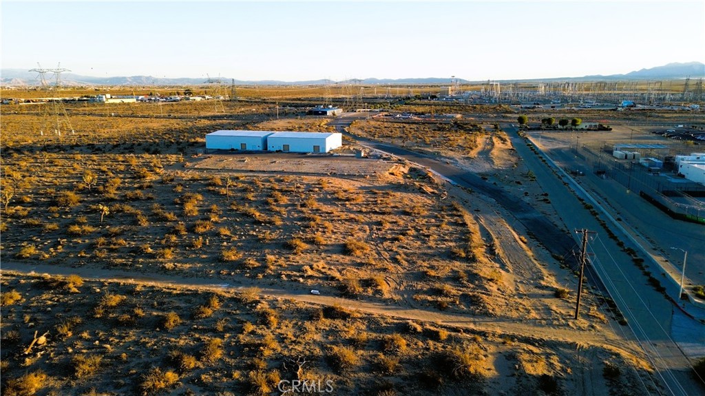 9 Violet Road Adelanto, CA 92301 - Photo 6 of 8 an aerial view of residential building and ocean view