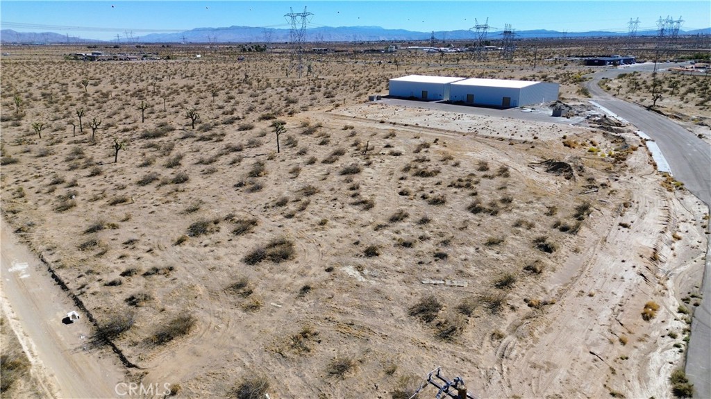9 Violet Road Adelanto, CA 92301 - Photo 8 of 8 a view of a backyard of a building