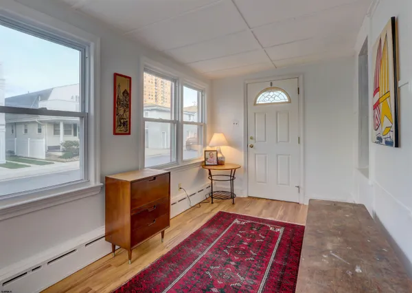 a bed room with a bed and a window