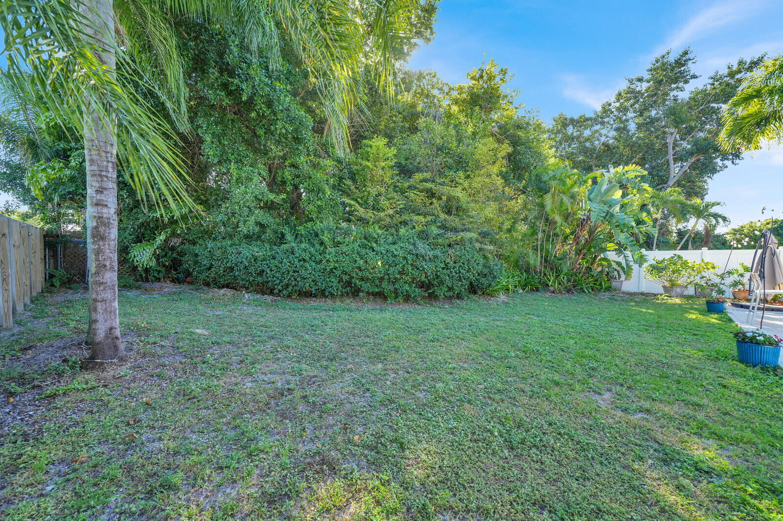 10406 Sleepy Brook Way Boca Raton, FL 33428 - Photo 35 of 36 a view of a yard with a tree
