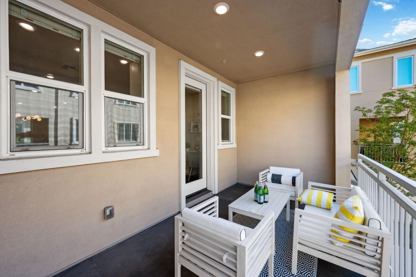 5977 Larkstone Loop San Jose, CA 95123 - Photo 26 of 63 a living room with furniture and a window