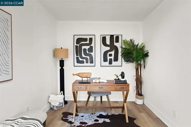 a view of a workspace with furniture