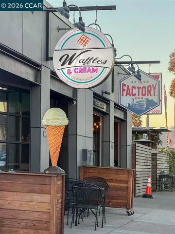 a view of a street with cars