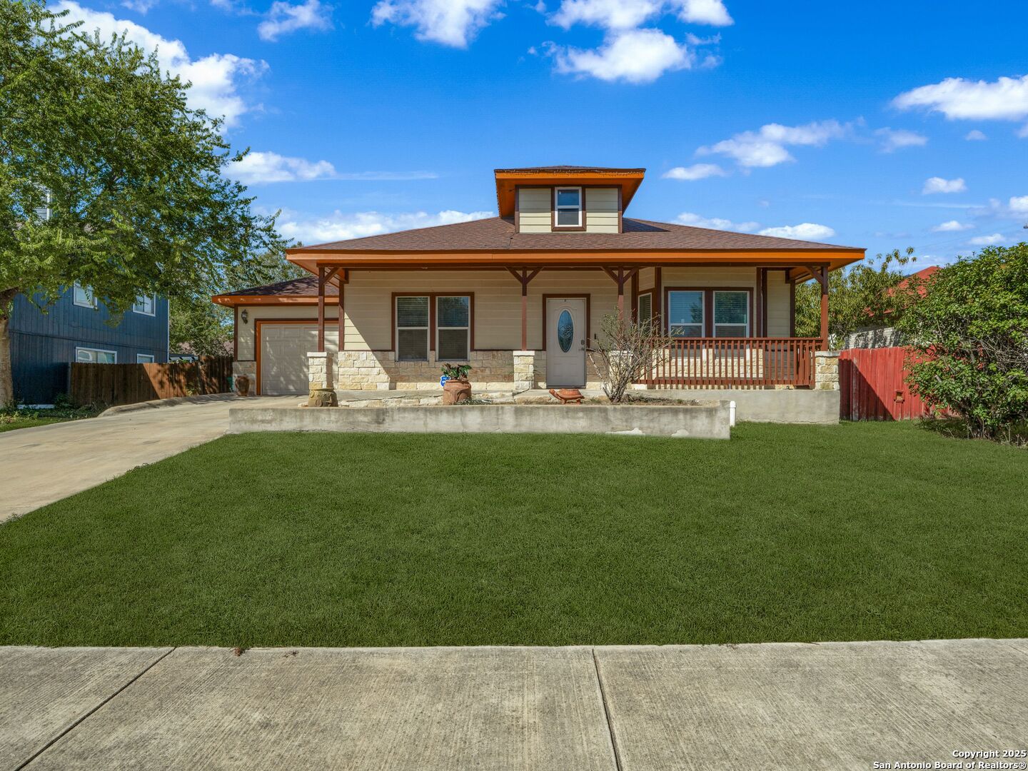 a front view of house with yard and seating area