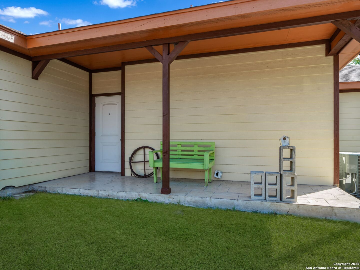 605 Meadow Gate Converse, TX 78109 - Photo 24 of 27 a backyard of a house with table and chairs