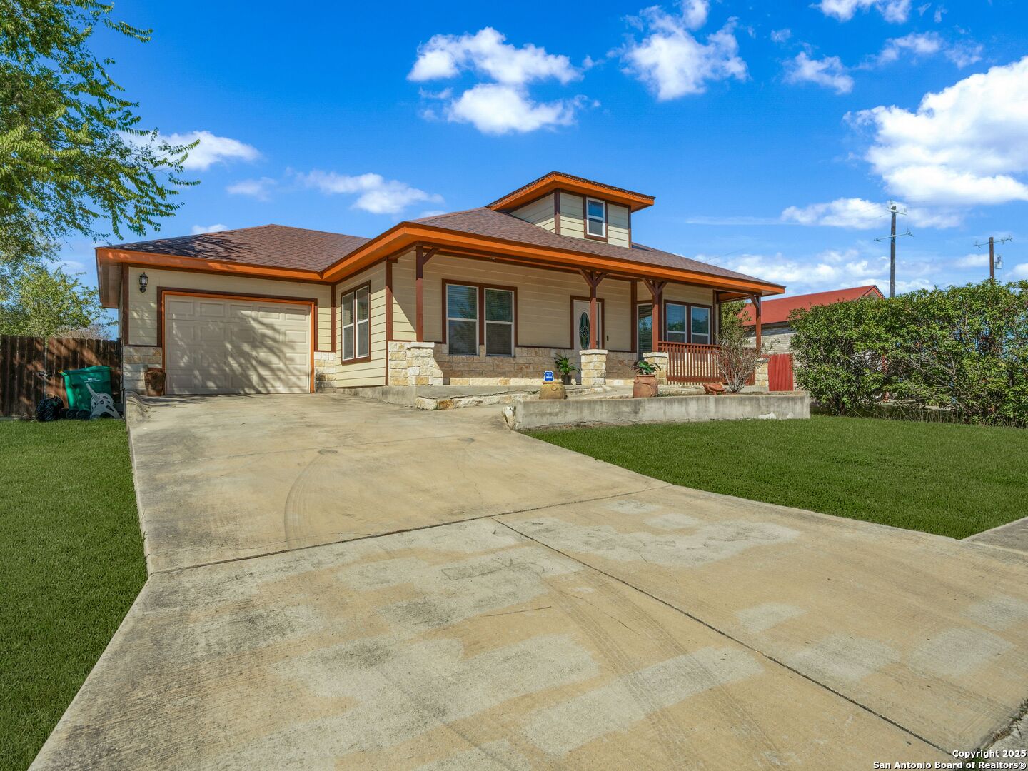 605 Meadow Gate Converse, TX 78109 - Photo 6 of 27 a front view of a house with a yard