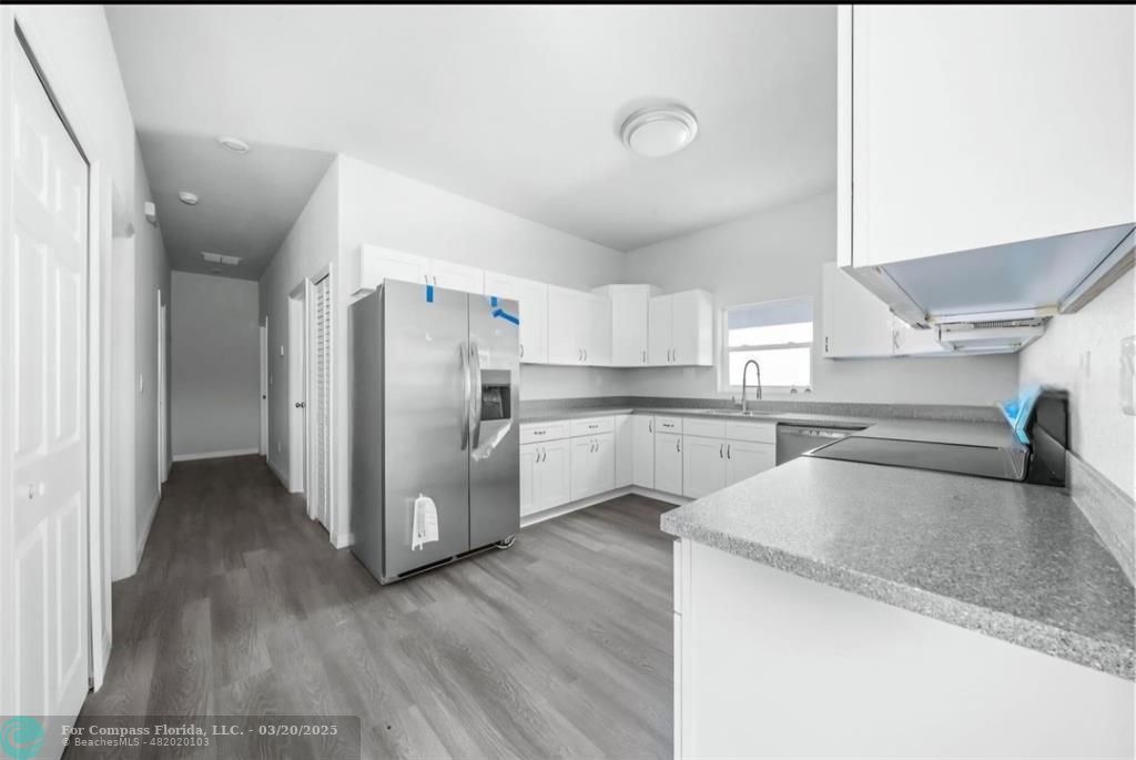 Undisclosed Address Sebring, FL 33870 - Photo 5 of 8 a kitchen with stainless steel appliances granite countertop a refrigerator and a sink