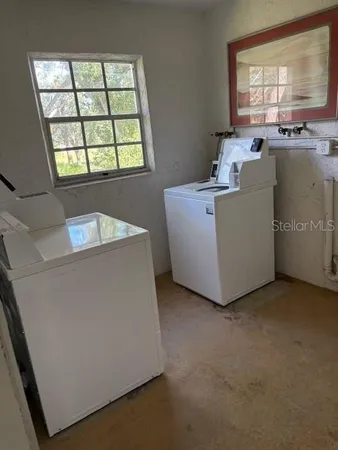 a room with furniture and window