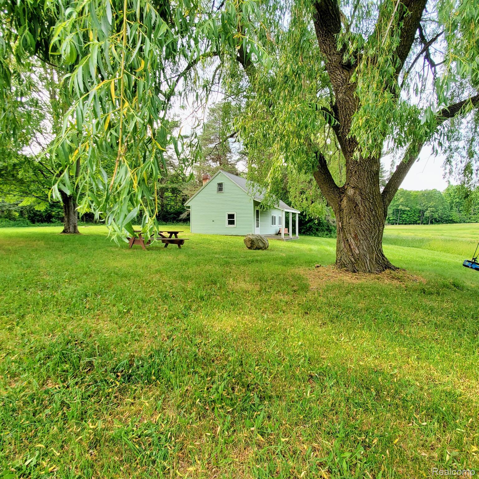 5253 North Henderson Road Davison, MI 48423 - Photo 12 of 51 Adorable camp bungalow along the woods & pond