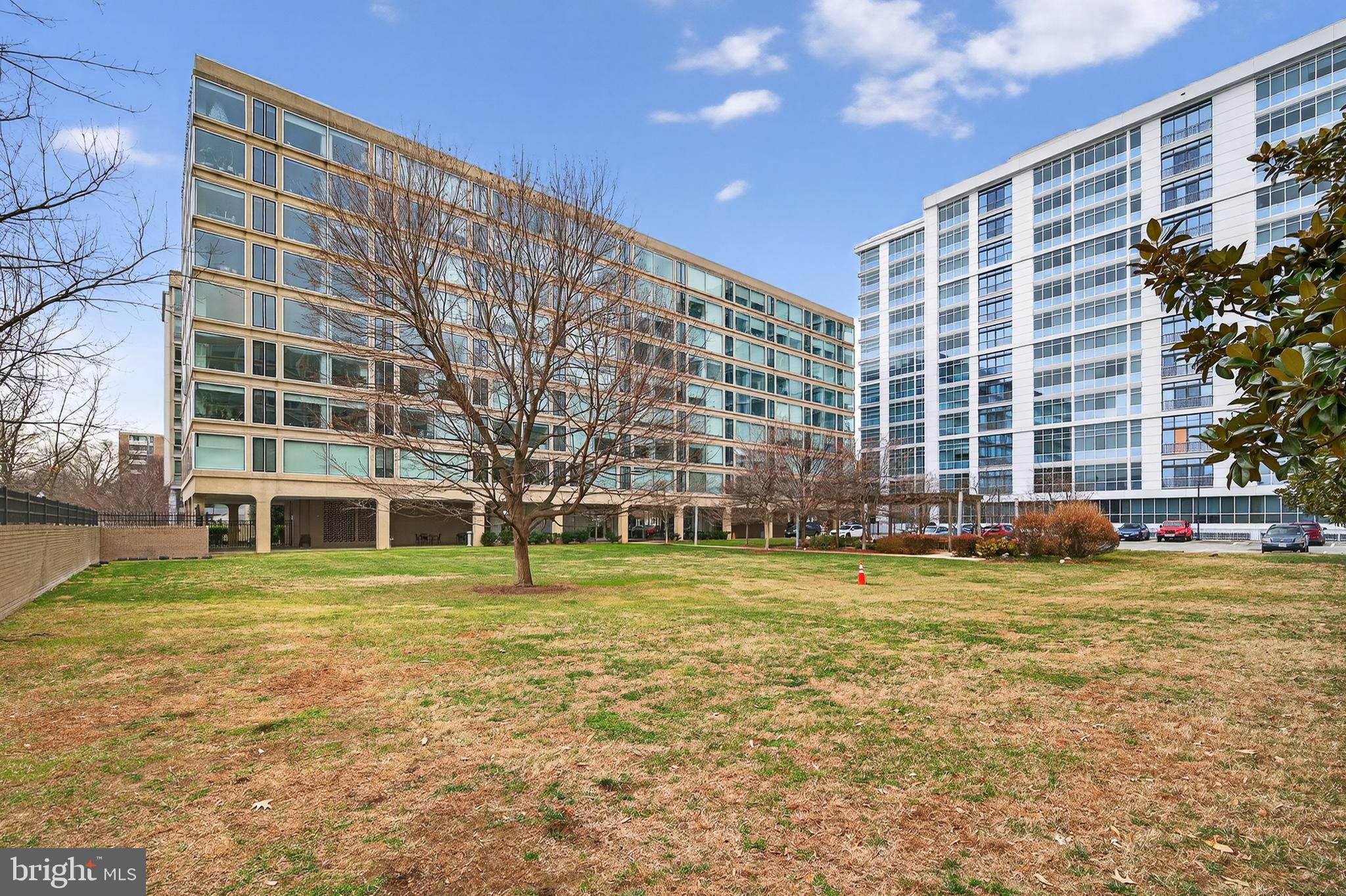 1101 3rd Street Southwest, Unit 503 Washington, DC 20024 - Photo 29 of 29 a view of a building with a yard