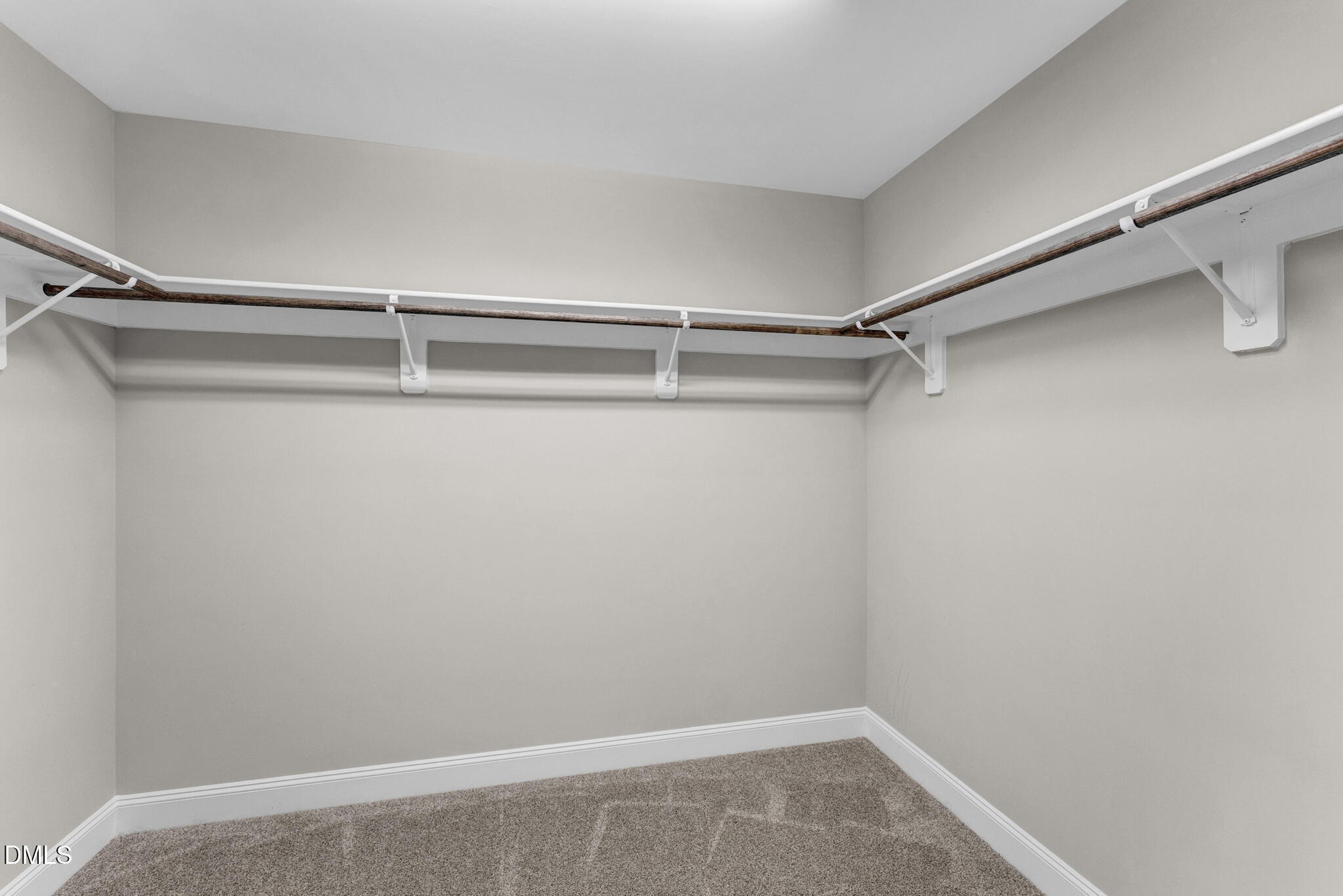 928 Barringer Drive Raleigh, NC 27606 - Photo 17 of 40 a view of walk in closet
