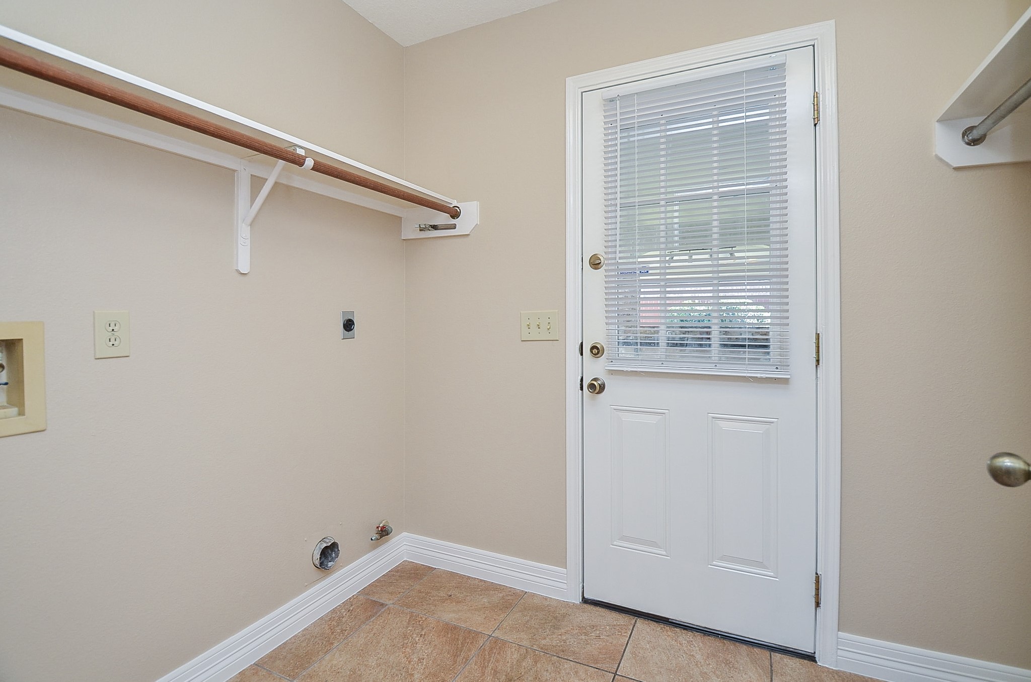 8803 Tweedbrook Drive Spring, TX 77379 - Photo 29 of 36 Discover the utility room.