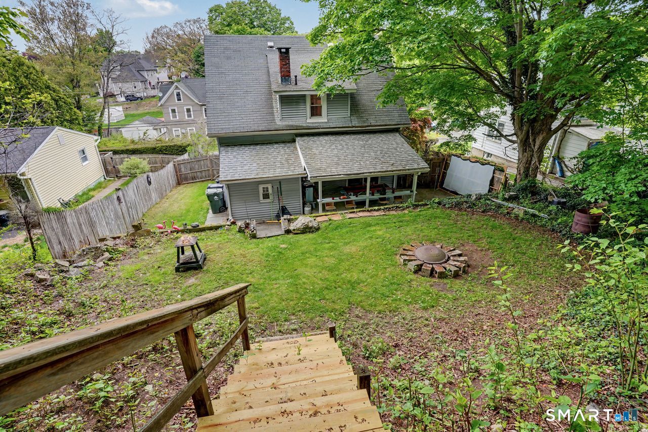 74 Maple Street Seymour, CT 06483 - Photo 39 of 40 a front view of a house with garden