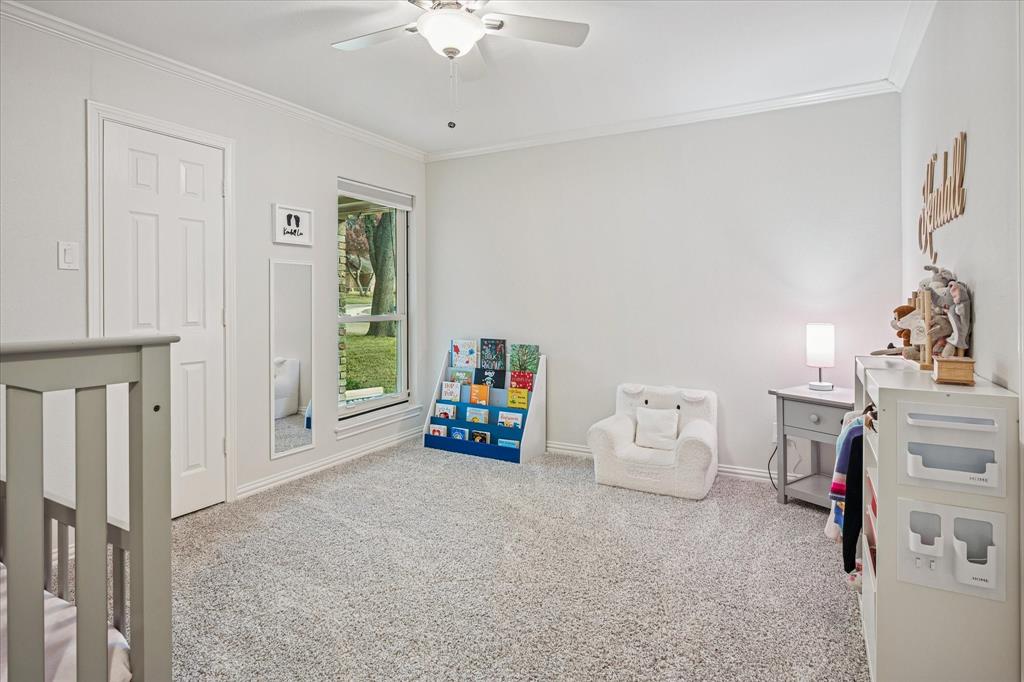 9545 Milltrail Drive Dallas, TX 75238 - Photo 19 of 30 a living room with furniture and a chandelier