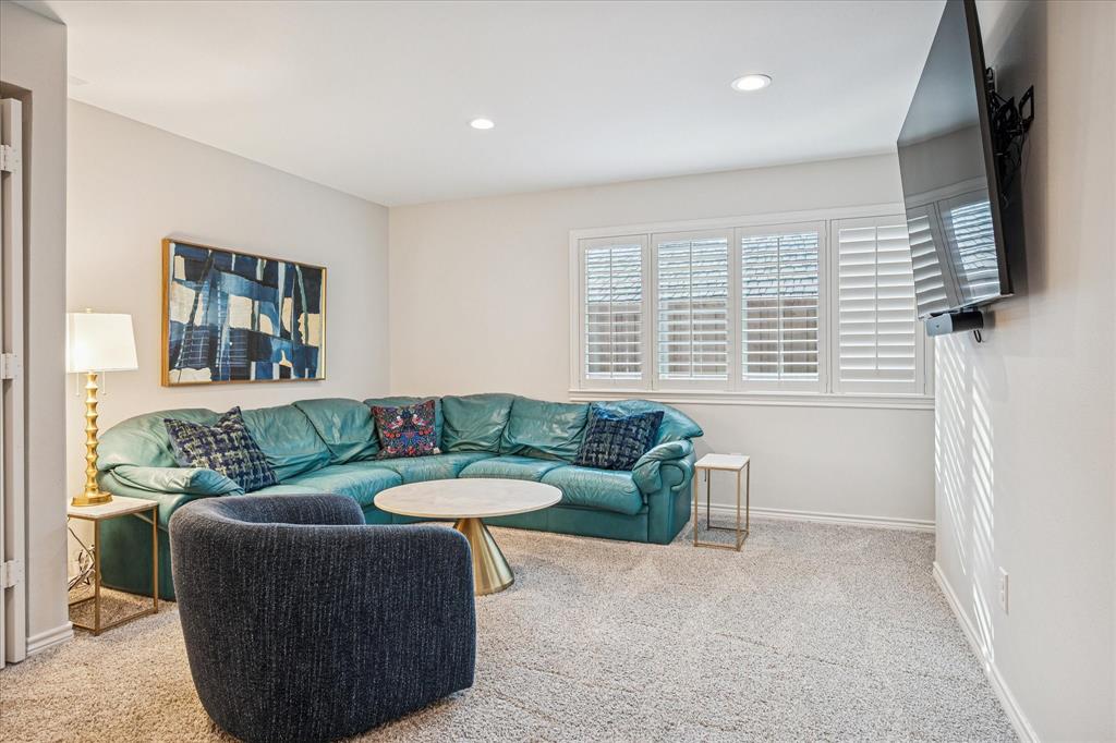 9545 Milltrail Drive Dallas, TX 75238 - Photo 21 of 30 a living room with furniture and a window