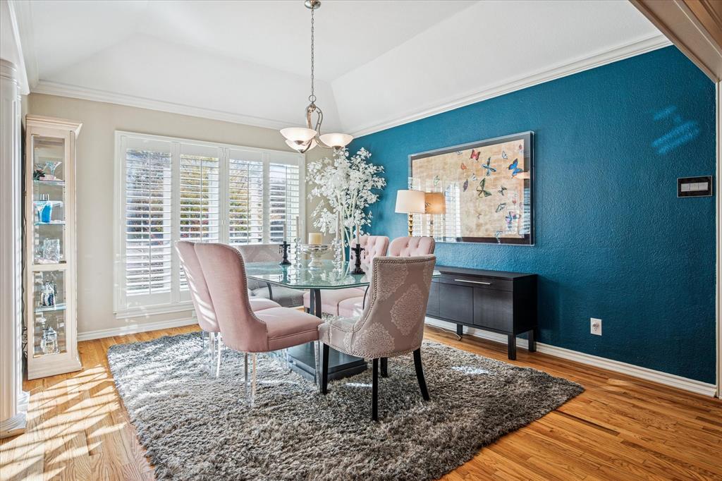 9545 Milltrail Drive Dallas, TX 75238 - Photo 6 of 30 a view of a dining room with furniture window and wooden floor