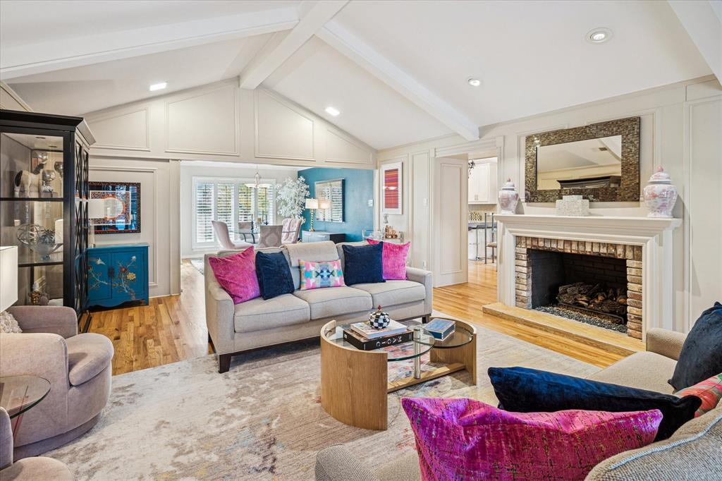 9545 Milltrail Drive Dallas, TX 75238 - Photo 8 of 30 a living room with furniture or flat screen tv and a fireplace