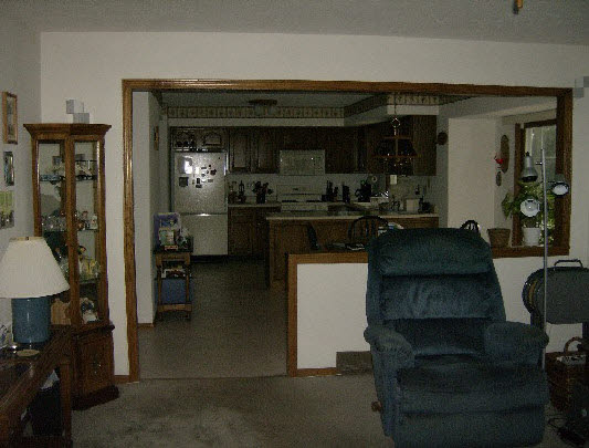 6835 Sentinel Road Rockford, IL 61107 - Photo 4 of 6 a kitchen with a stove and a refrigerator