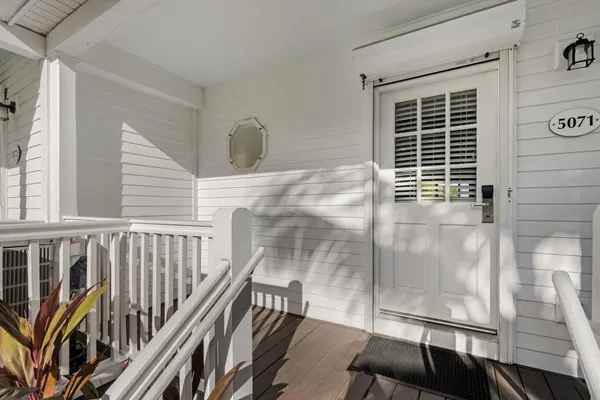 a view of hallway with windows