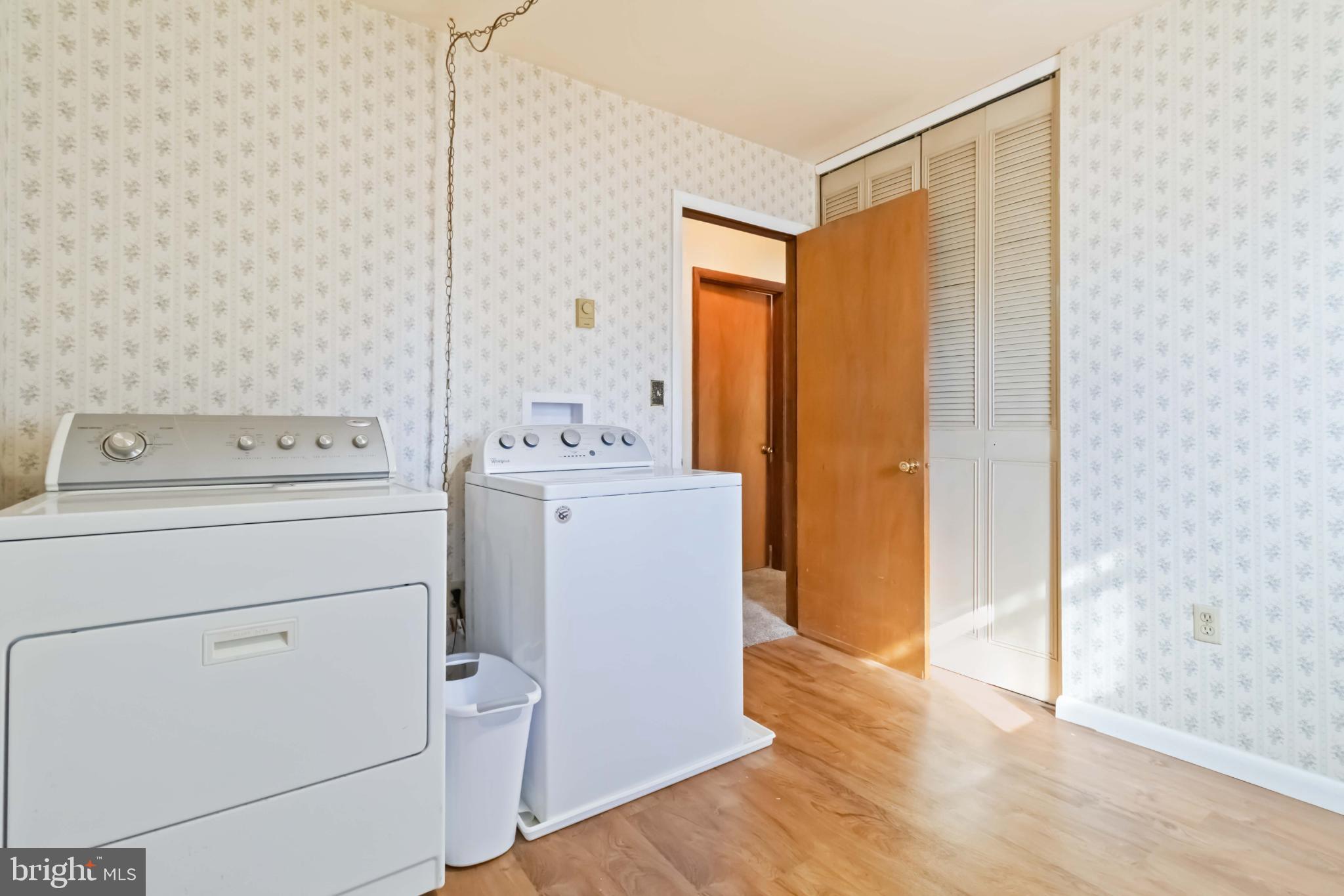 6216 Blue Grass Avenue Harrisburg, PA 17112 - Photo 14 of 23 a utility room with dryer and washer