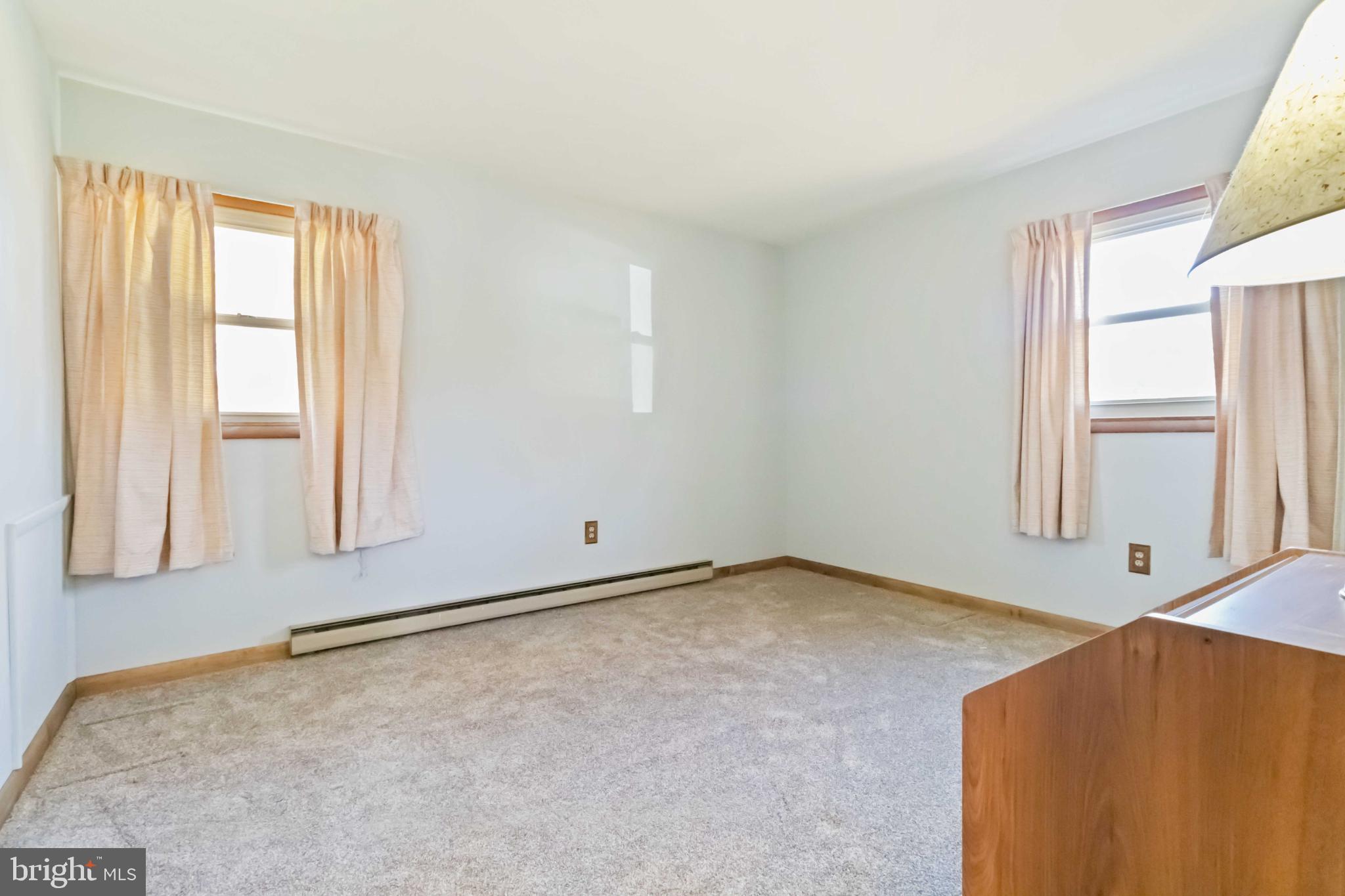 6216 Blue Grass Avenue Harrisburg, PA 17112 - Photo 17 of 23 an empty room with windows