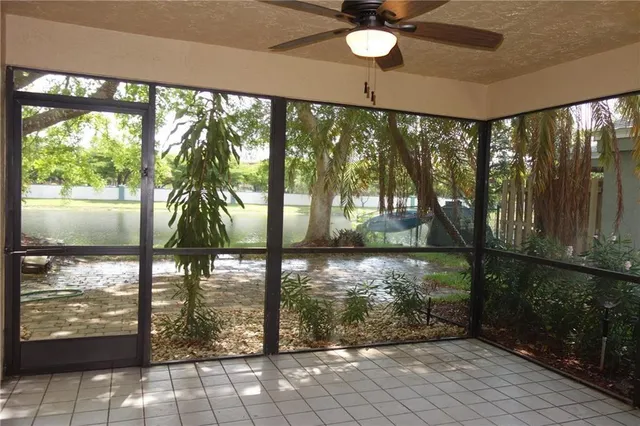 a bathroom with a granite countertop toilet a sink and bathtub