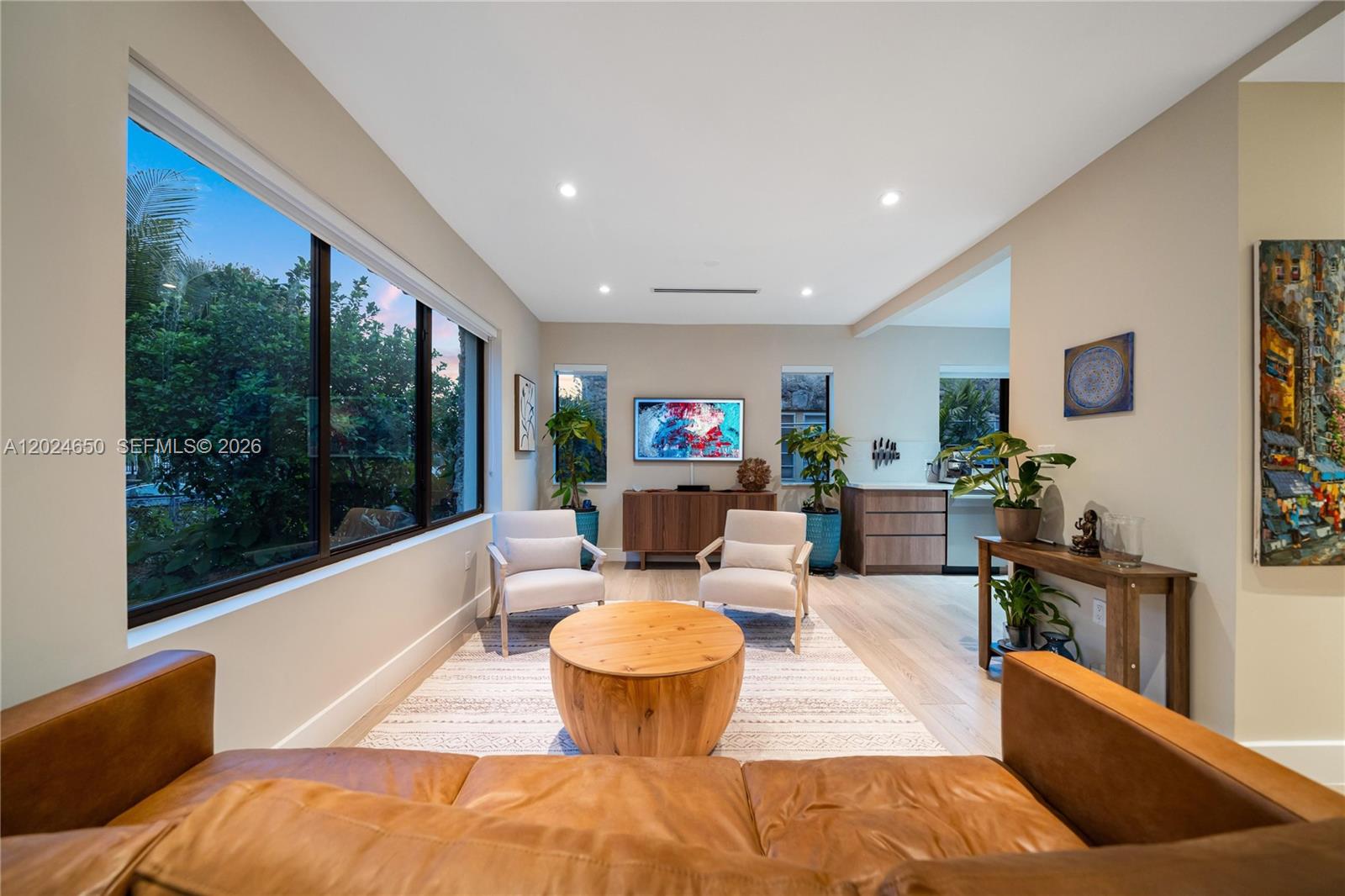 1663 Southwest 13th Street Miami, FL 33145 - Photo 69 of 112 a living room with furniture and a flat screen tv