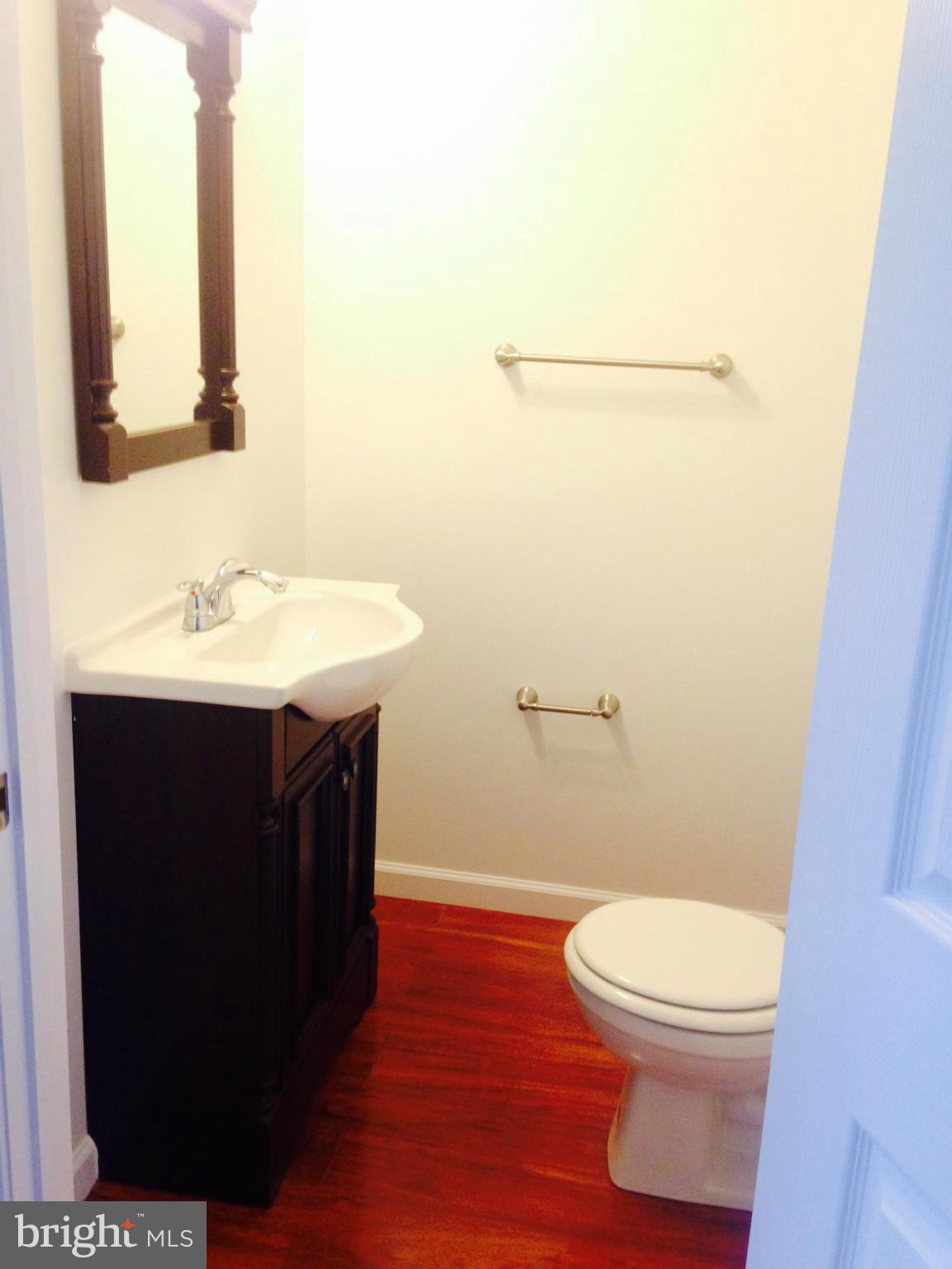 4010 Cedardale Road Baltimore, MD 21215 - Photo 3 of 15 1st Fl Powder Rm