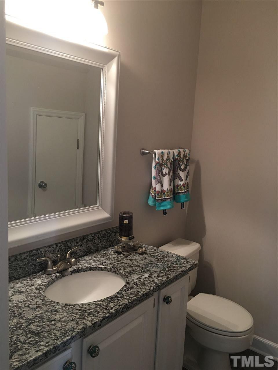 7504 Wilderness Road Raleigh, NC 27613 - Photo 8 of 25 Downstairs Powder Room