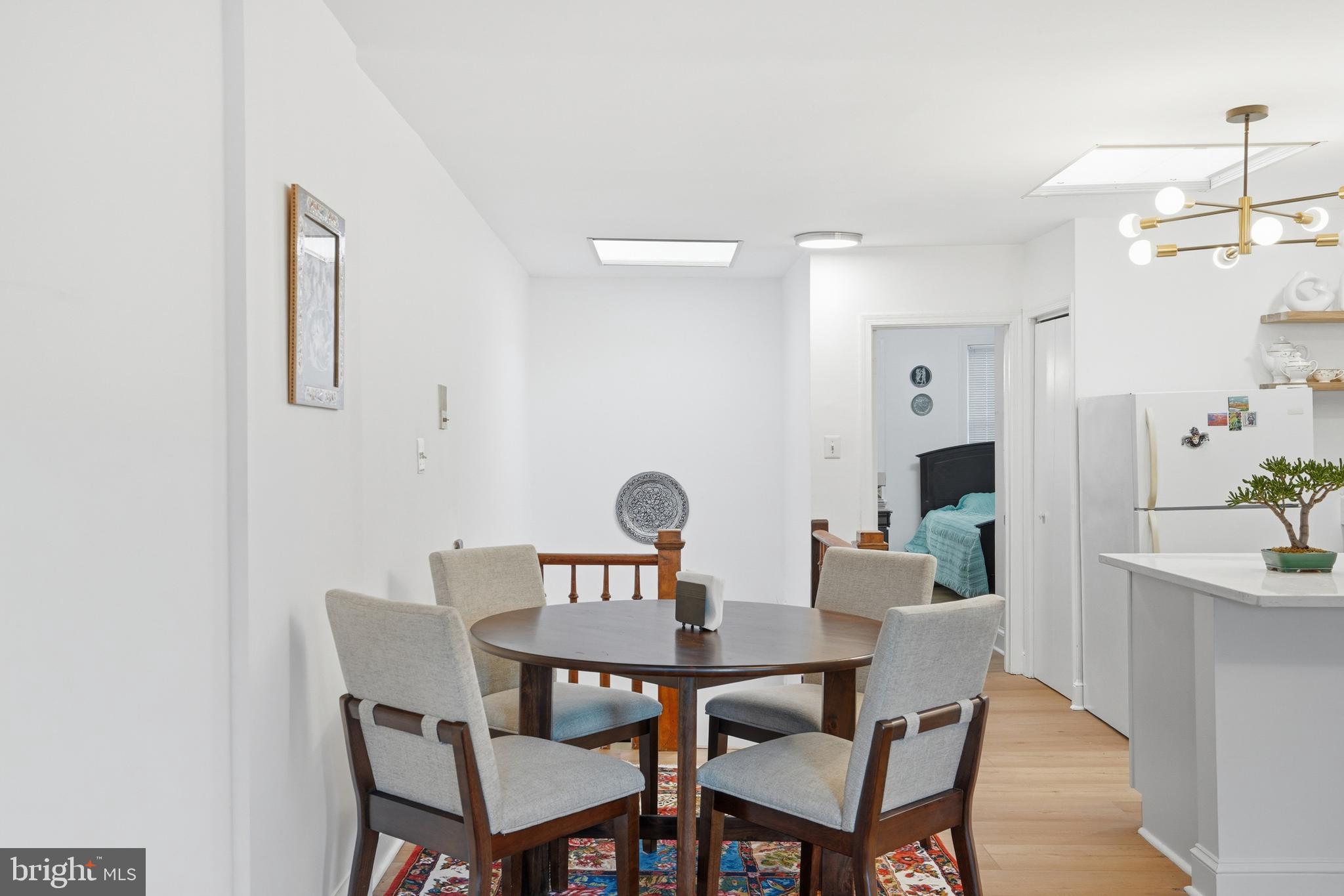 313 C Street Southeast Washington, DC 20003 - Photo 16 of 47 a view of a dining room with furniture and wooden floor