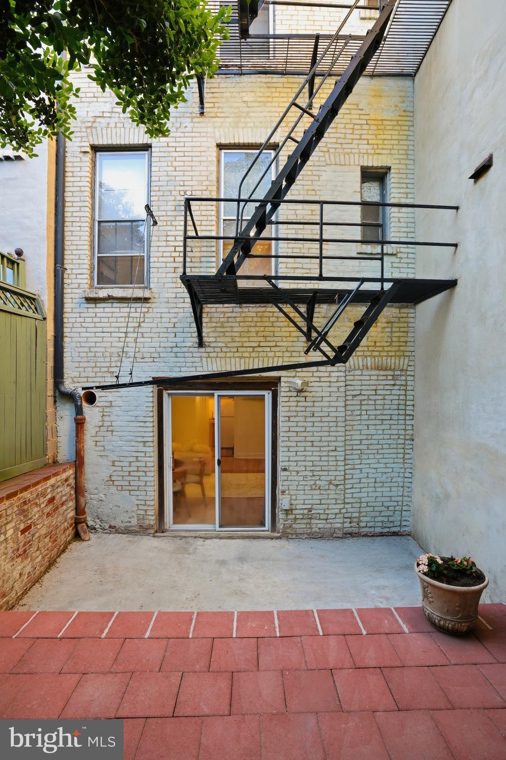 313 C Street Southeast Washington, DC 20003 - Photo 44 of 47 a front view of a house with a garage