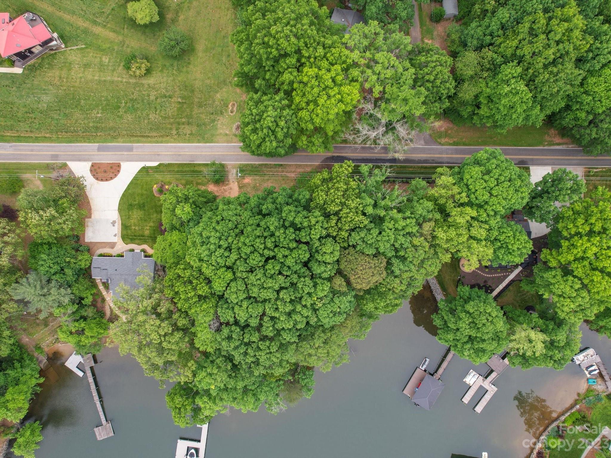 4614 Kiser Island Road Terrell, NC 28682 - Photo 14 of 28 an aerial view of a house with a yard and lake view