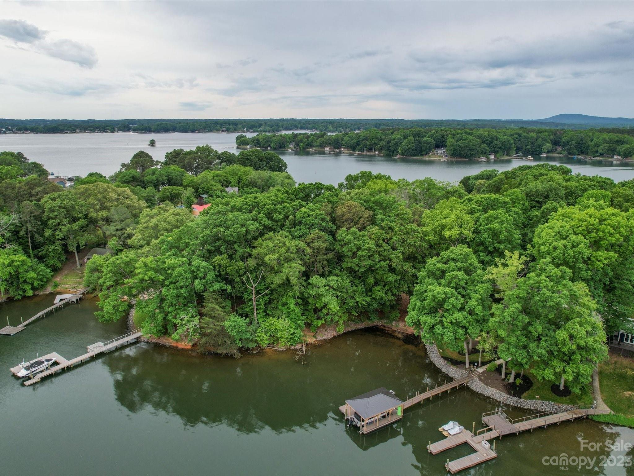 4614 Kiser Island Road Terrell, NC 28682 - Photo 24 of 28 an aerial view of a houses with a lake view